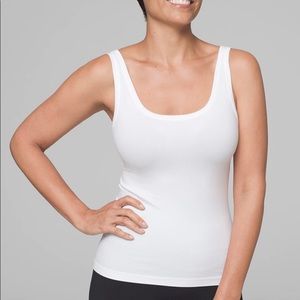 High quality whiteTank tops ( 2 tanks for$25)